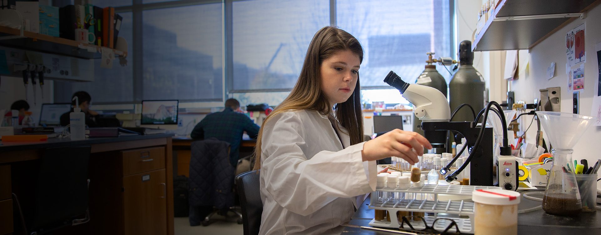 A student analyzes samples in a research lab